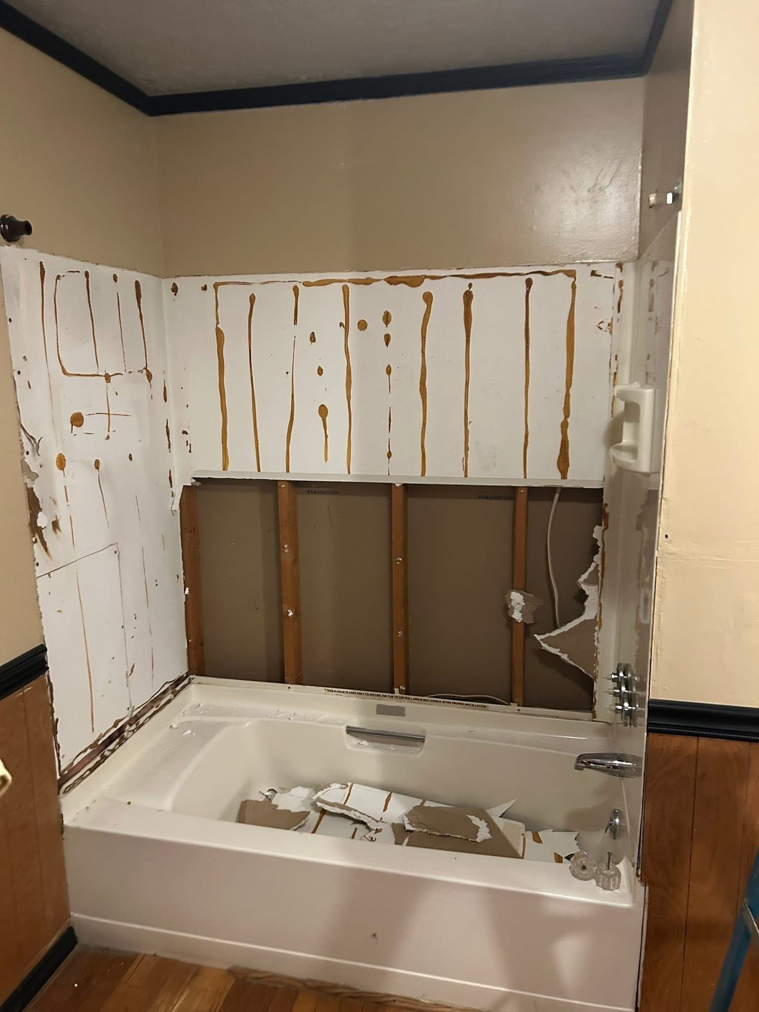 Before: Black-Trim Subway Shower