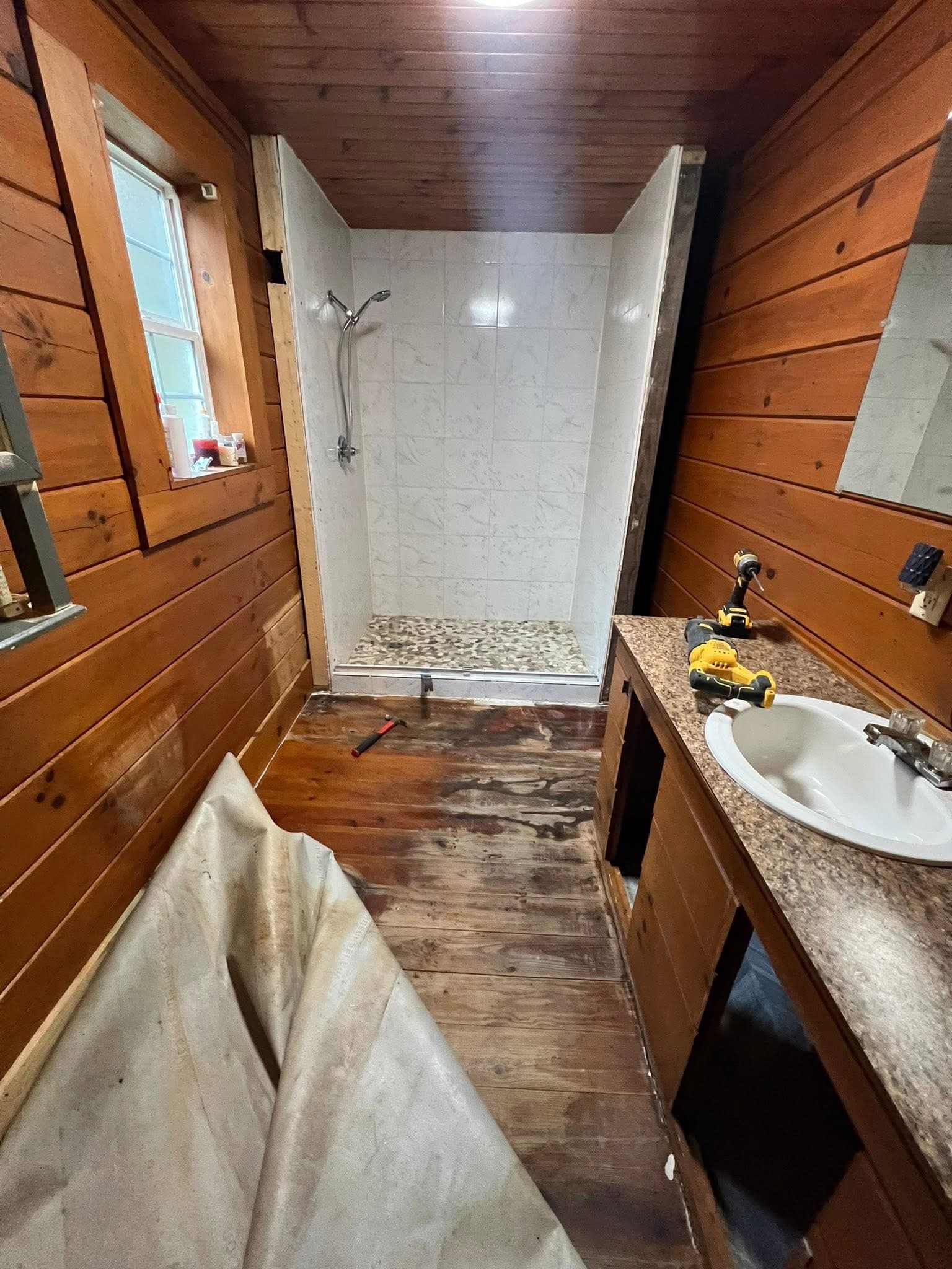 Before: Cabin Travertine Herringbone Shower