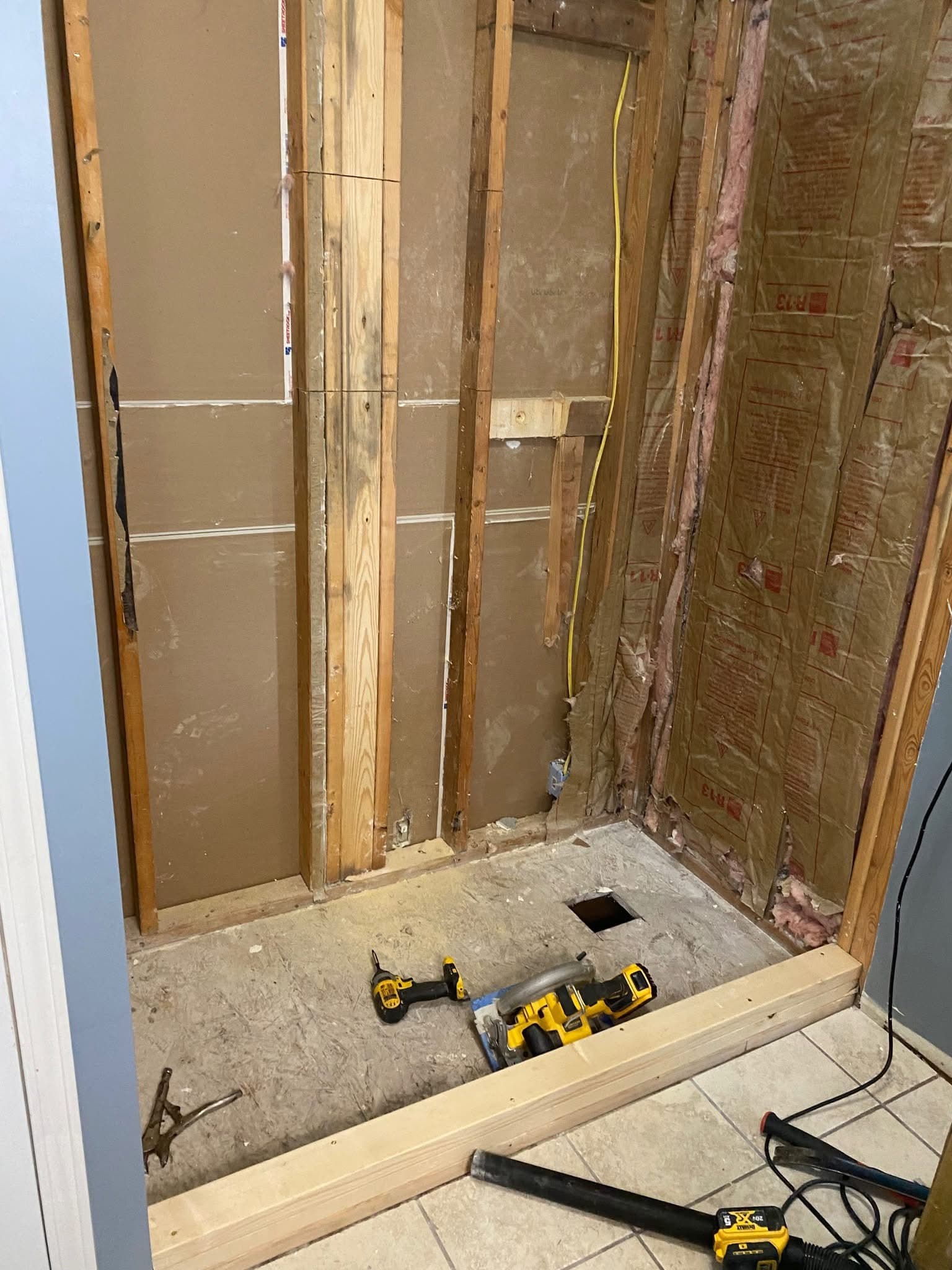 Before: Subway Shower with Pebble Floor