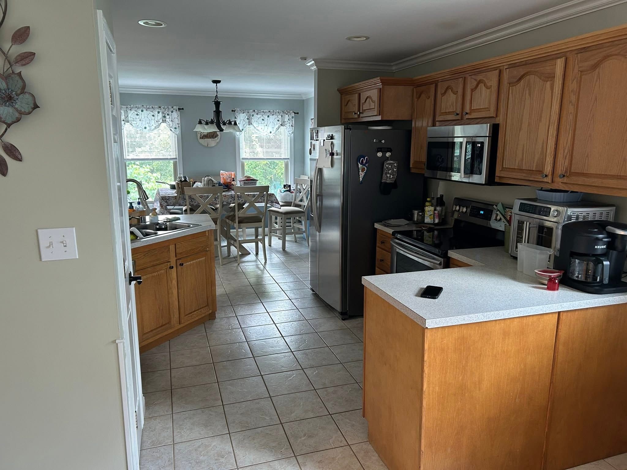 Before: Cream Kitchen with Brick Backsplash